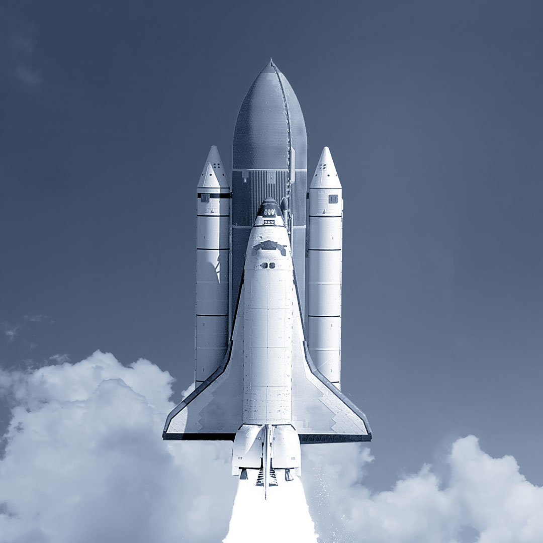 Space shuttle and rockets taking off