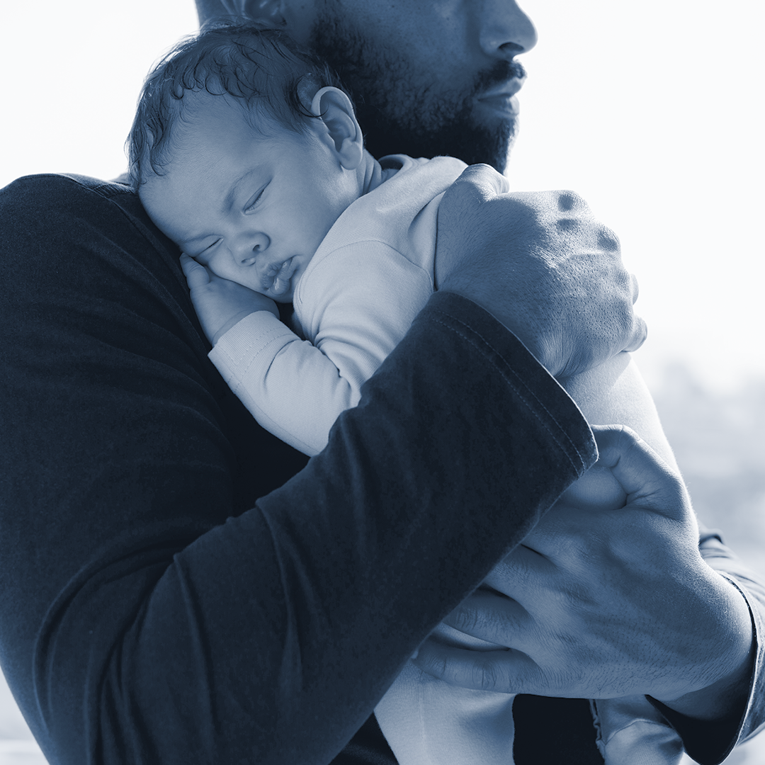 Man holding a baby