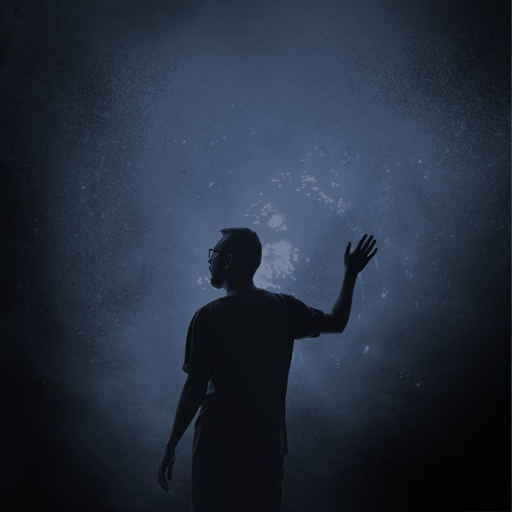 Silhouette of a man waving